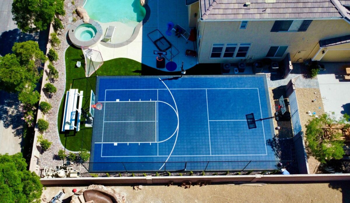 Backyard basketball court in Henderson, Nevada installed by Legendary Sports Construction