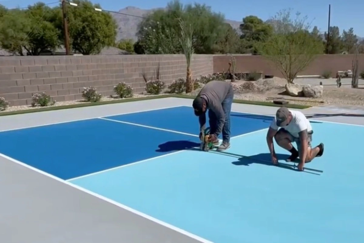 Crew resurfacing a sport court in the Las Vegas Valley