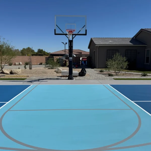 Well-maintained backyard sport court with safety fencing in the Las Vegas Valley