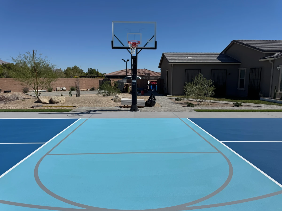 Well-maintained backyard sport court with safety fencing in the Las Vegas Valley